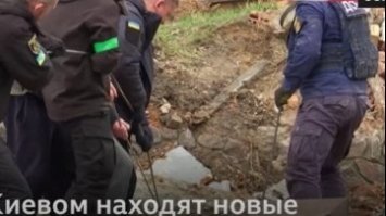 Під Києвом виявили ще одну братську могилу (ВІДЕО)